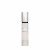 LUEUR skincare serum in white cylindrical bottle with silver metallic cap and lotus logo label