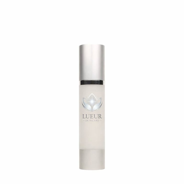 LUEUR skincare serum in white cylindrical bottle with silver metallic cap and lotus logo label